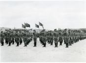 Fotografia do juramento da bandeira durante o encerramento do ano letivo na Academia Militar