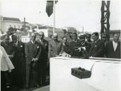 Fotografia de Américo Tomás, nos Estaleiros da C.U.F., em Lisboa, durante a cerimónia do lançamento de dois navios arrastões destinados à pesca do bacalhau, o “Pedro de Barcelos” e o “João Álvaro Fagundes”