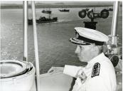 Fotografia de Américo Tomás a bordo no navio João de Lisboa, perto de Vila Real de Santo António, por ocasião da visita oficial realizada ao Algarve, de 11 a 14 de julho de 1965